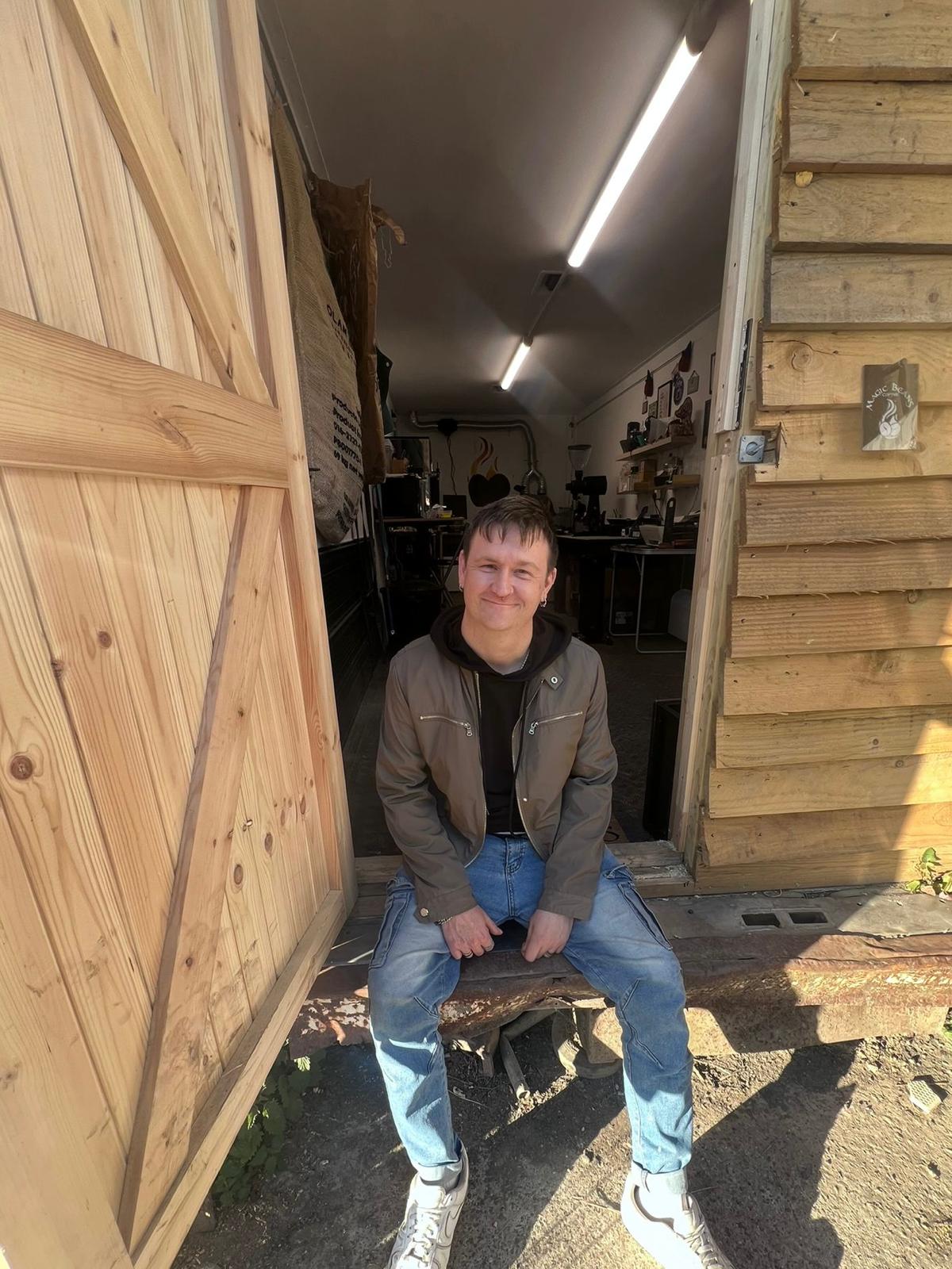 Our founder at the Magic Beans micro roastery door
